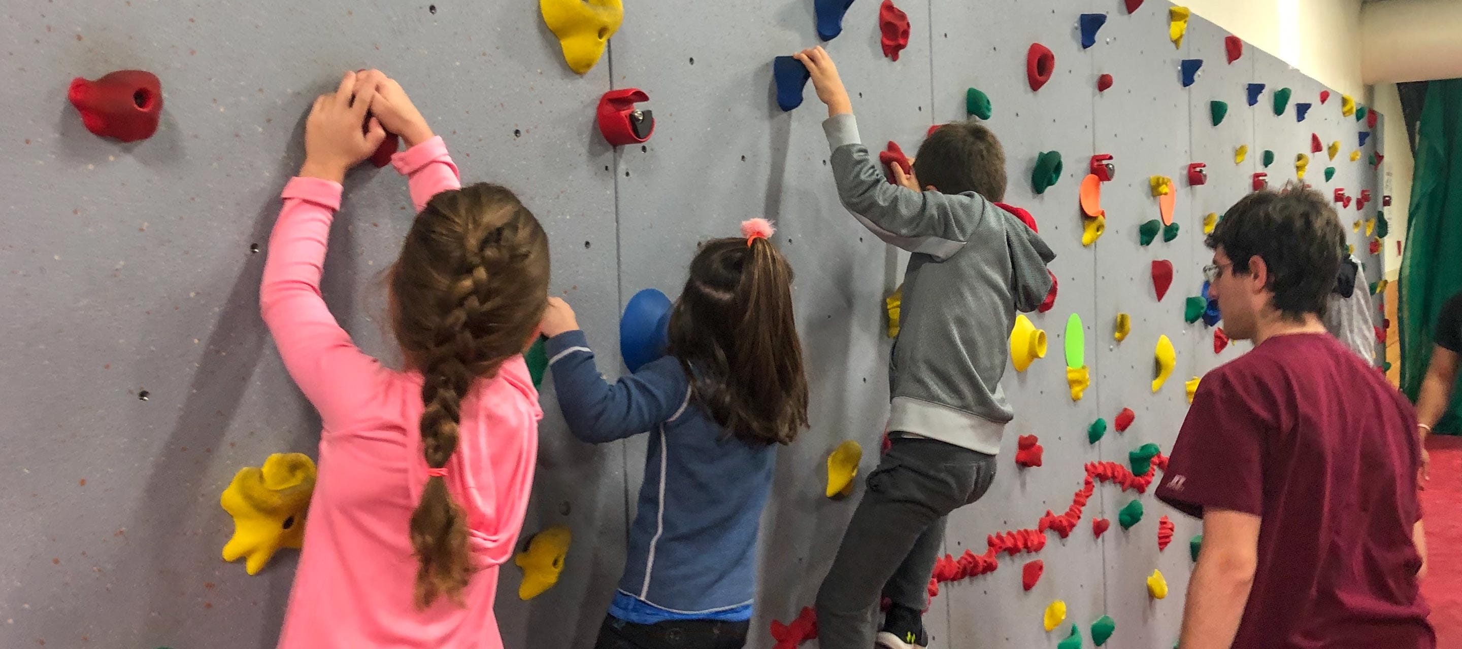 Rock climbing at a new camper party